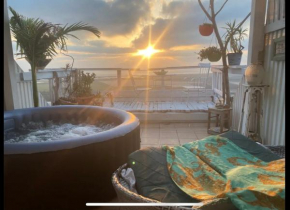 Artistic Sea View Getaway with Hot Tub
